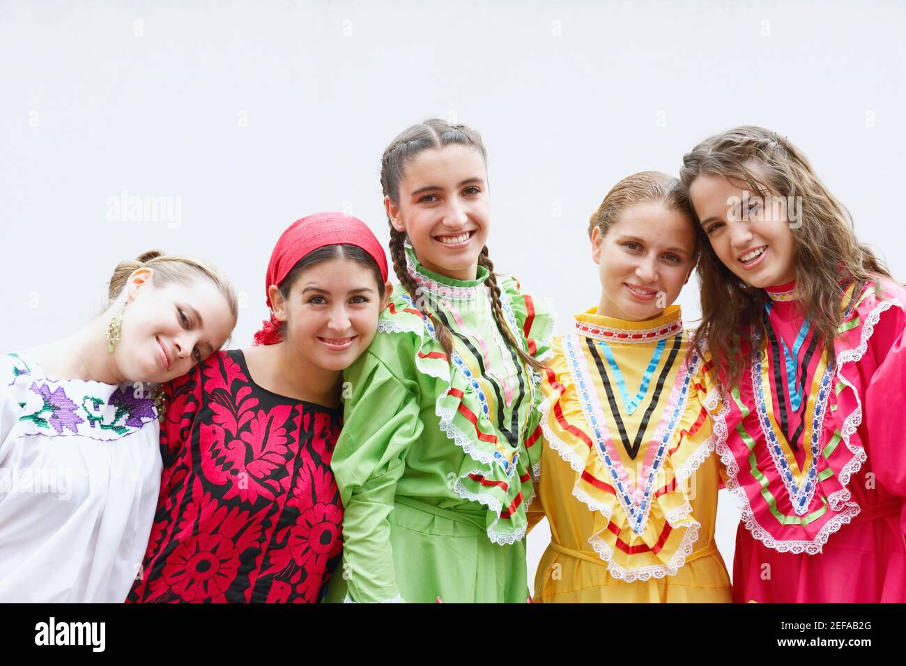 Five young women with arms around hi-res stock photography and images ...