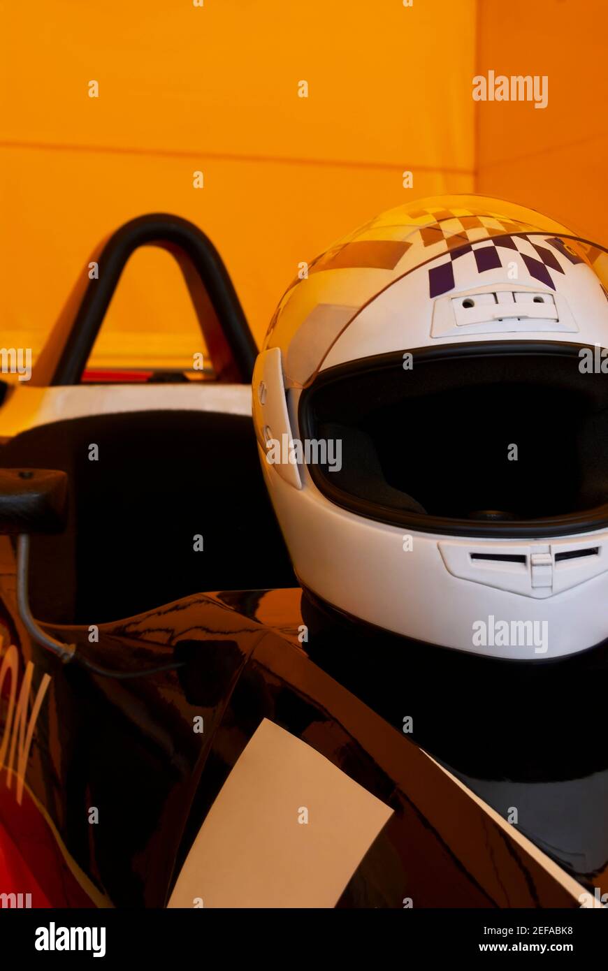 Close-up of a crash helmet on a racecar Stock Photo