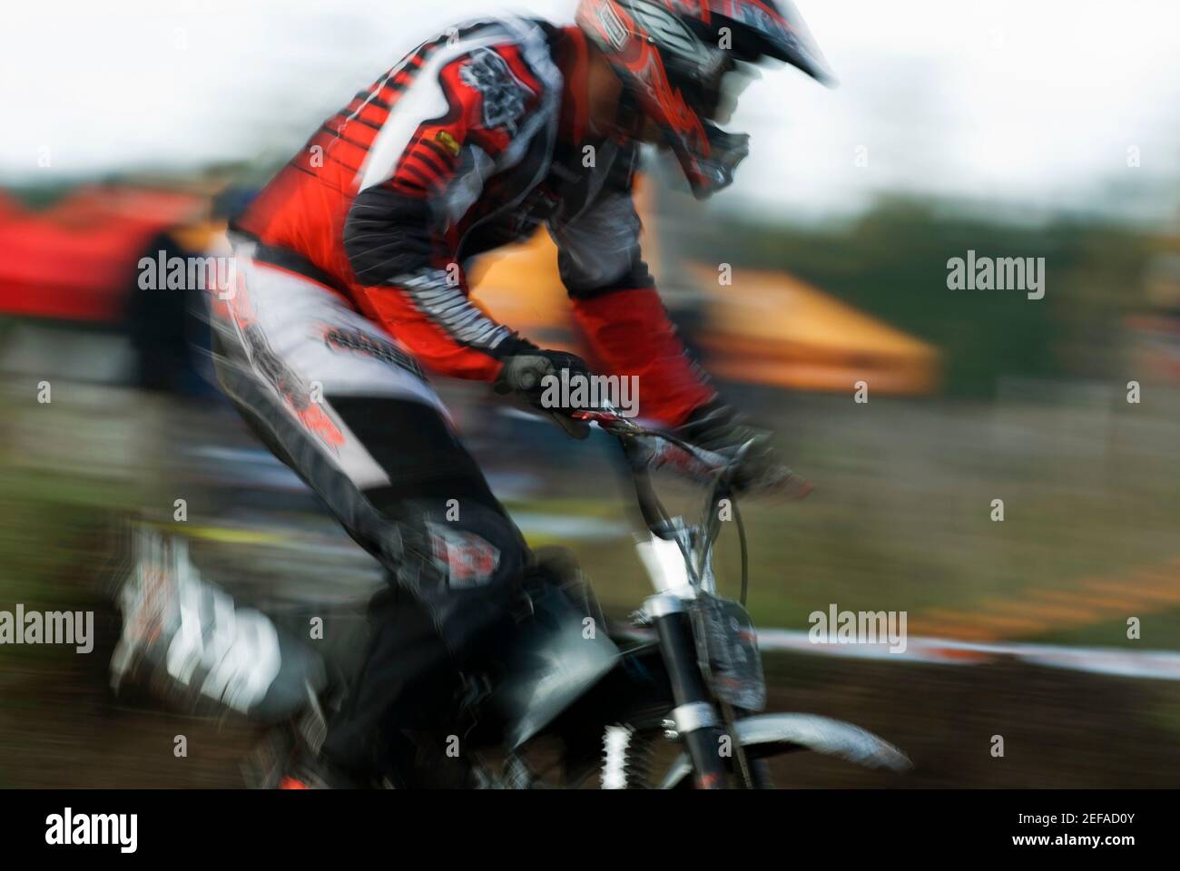 Side profile of a man on a racing bike Stock Photo - Alamy