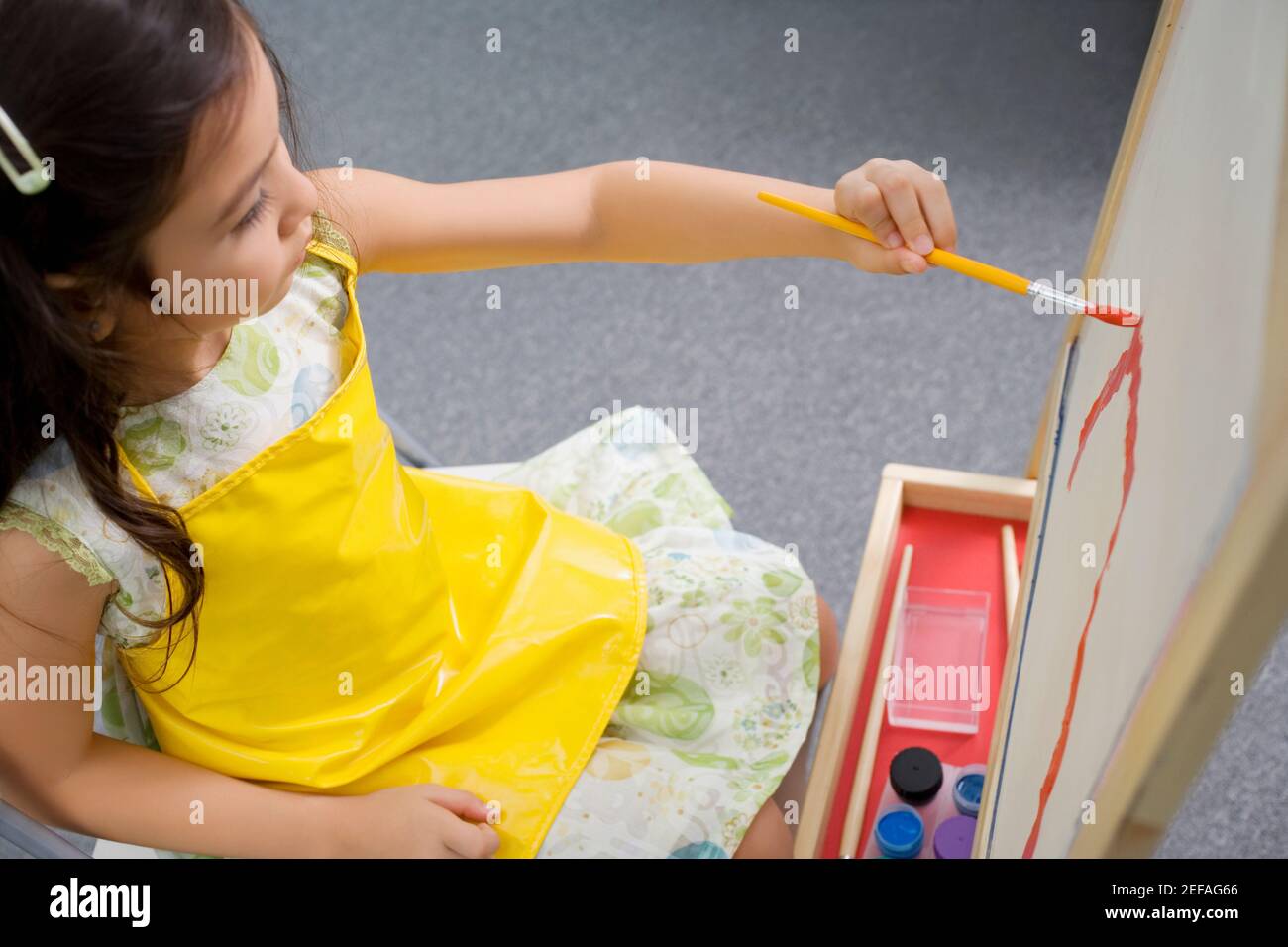 High angle view of a schoolgirl painting in an art class Stock Photo ...