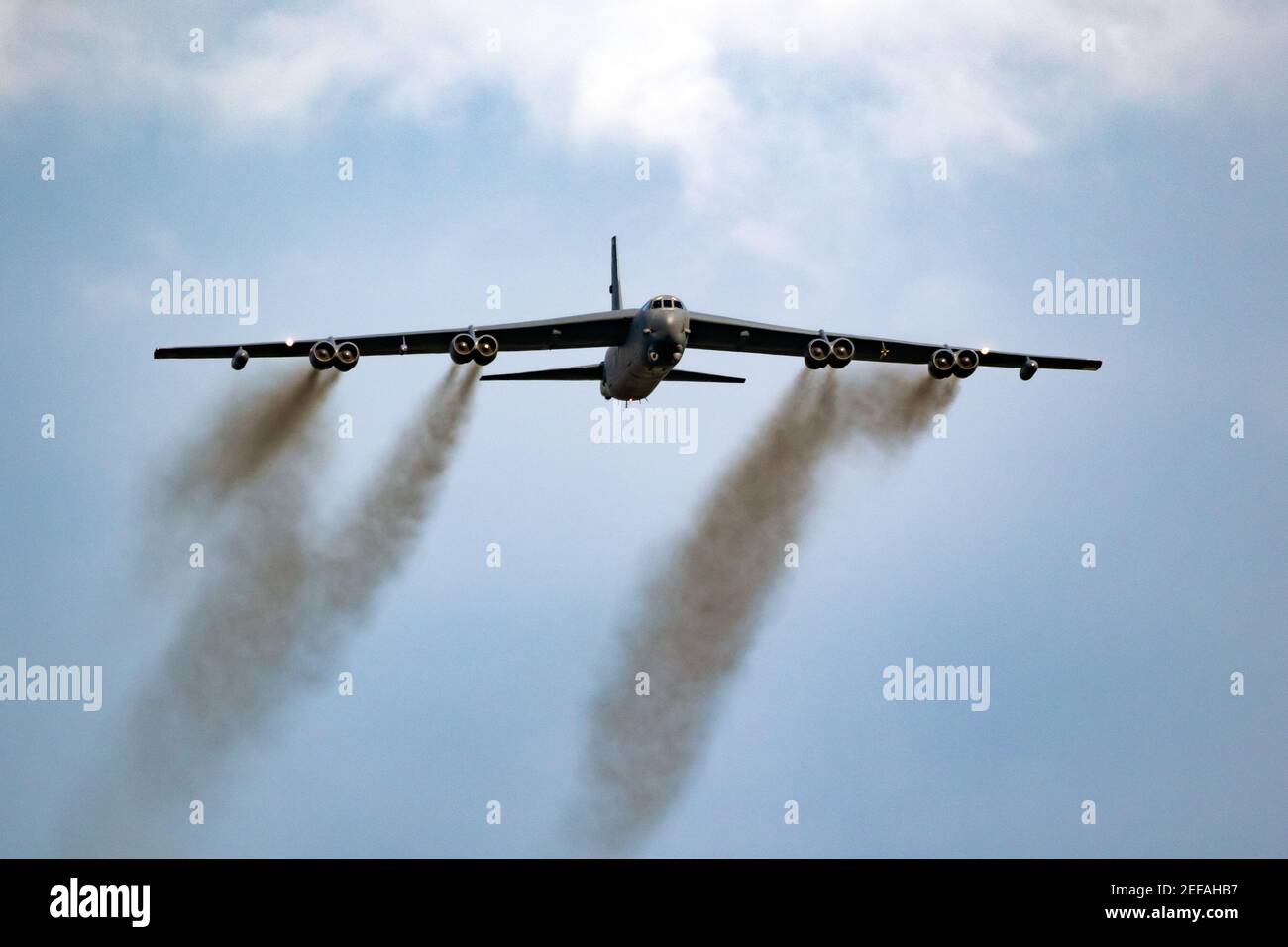 US Air Force Boeing B-52 Stratofortress bomber aircraft performing a low-pass at the Sanice Sunset Airshow. Belgium - September 13, 2019 Stock Photo