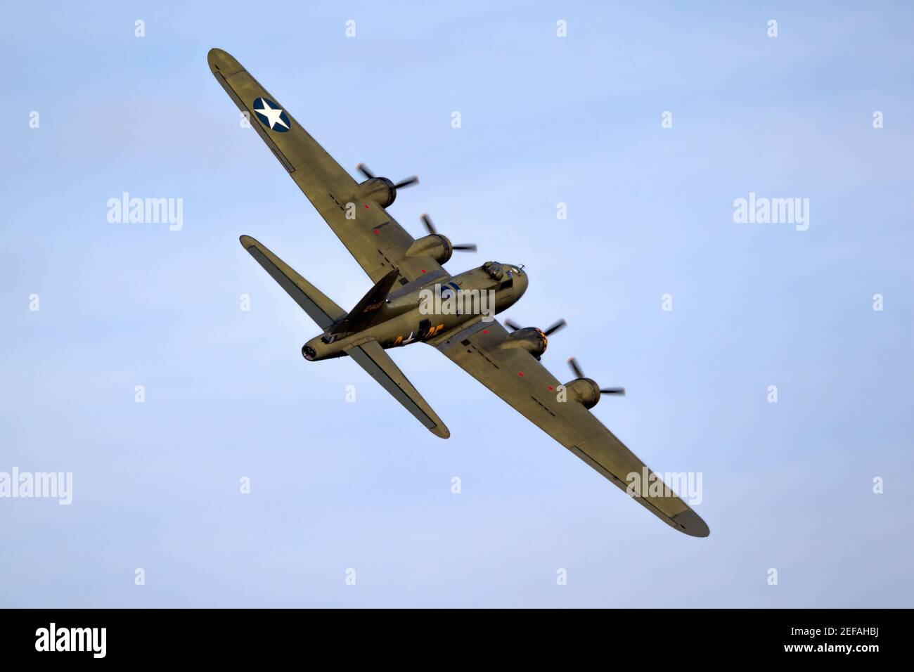 Vintage warbird US Air Force Boeing B-17 Flying Fortress WW2 bomber plane perforing at the Sanice Sunset Airshow. Belgium - September 13, 2019. Stock Photo