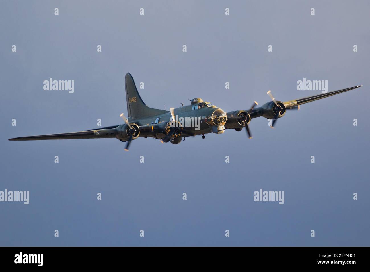 Vintage warbird US Air Force Boeing B-17 Flying Fortress WW2 bomber plane perforing at the Sanice Sunset Airshow. Belgium - September 13, 2019. Stock Photo
