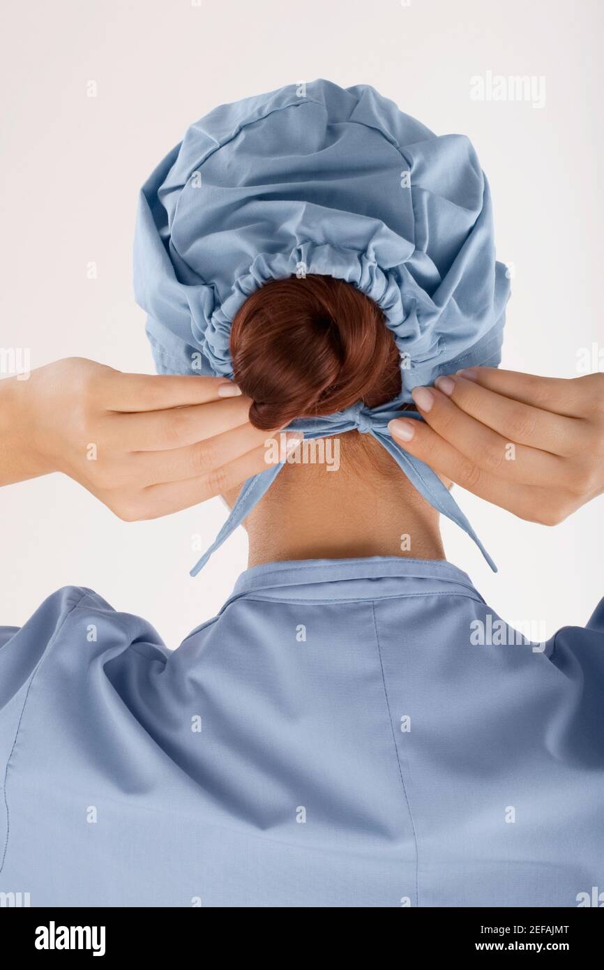 Rear view of a female doctor wearing a surgical cap Stock Photo Alamy
