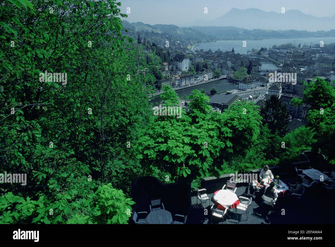 High angle view of a group of people sitting at a hotel, Chateau Gutsch, Lucerne, Switzerland Stock Photo