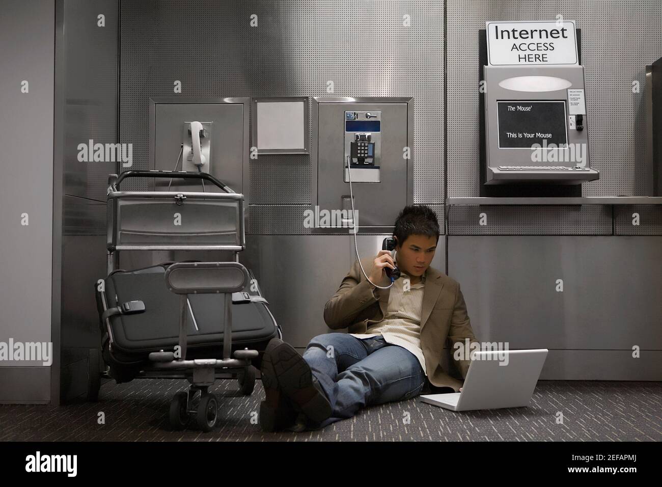 Using a public payphone hi-res stock photography and images - Alamy