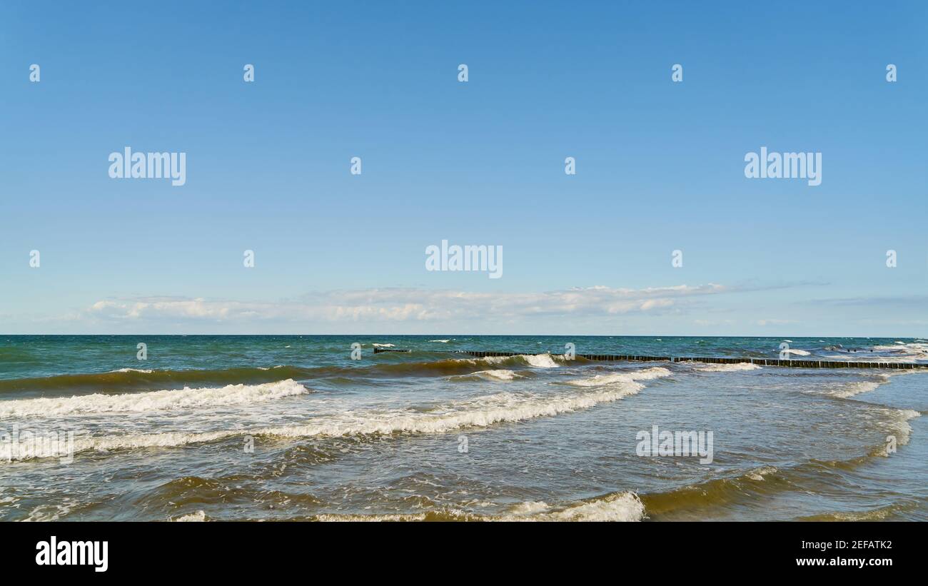 Blue sky and white clouds over sea with waves on the Baltic Sea Stock ...