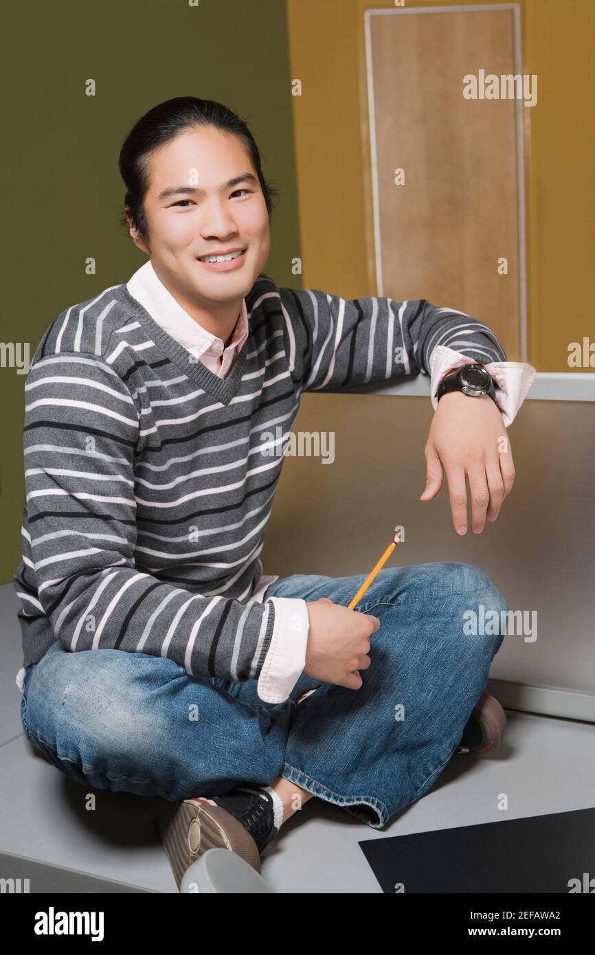 Portrait of a young man smiling Stock Photo - Alamy