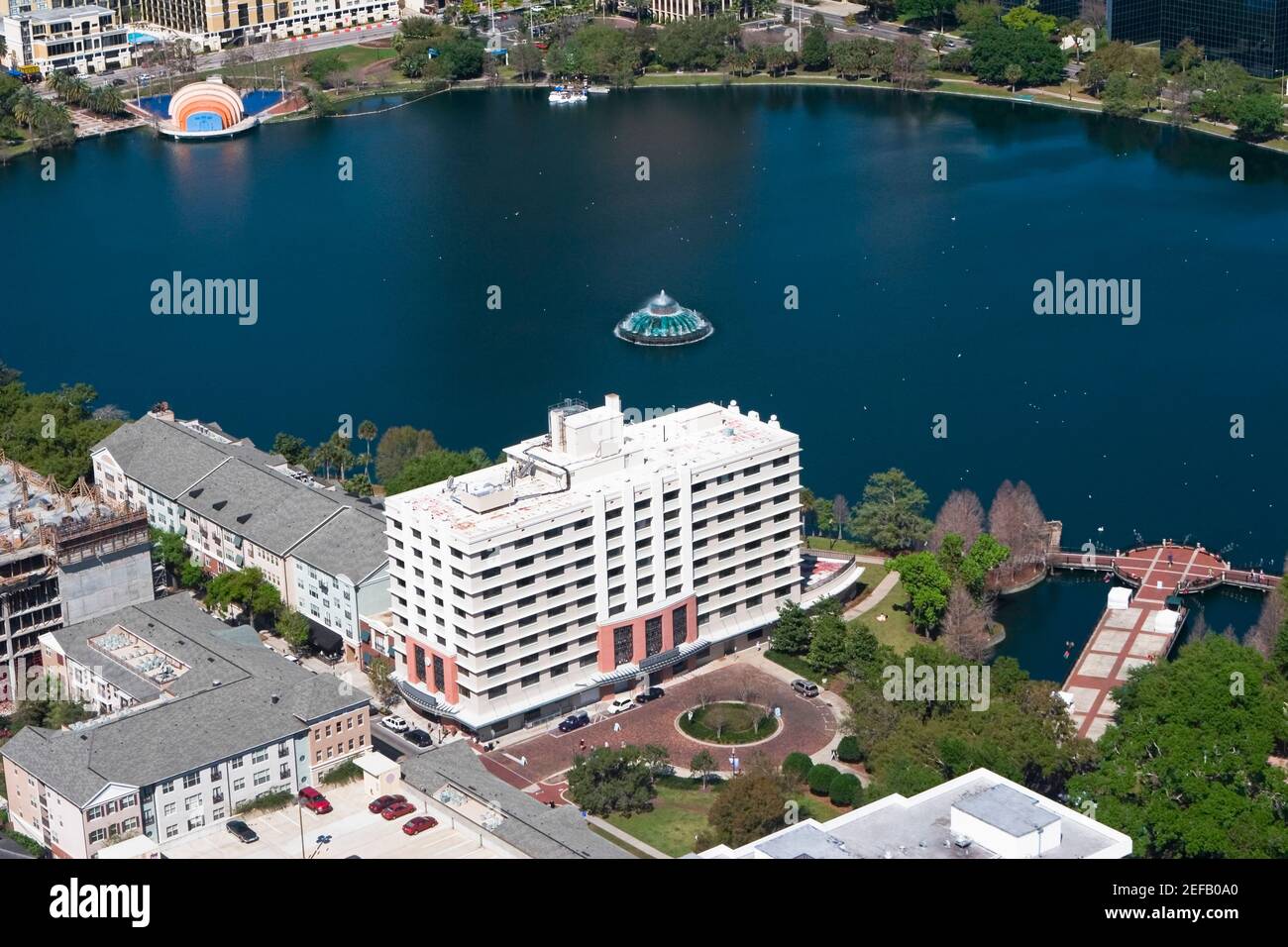 Aerial view of buildings along a lake, Lake Eola, Lake Eola Park