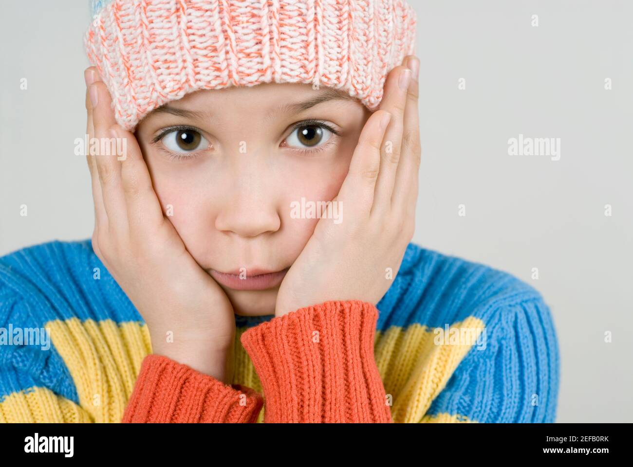 Close up of a girl thinking and puckering Stock Photo - Alamy