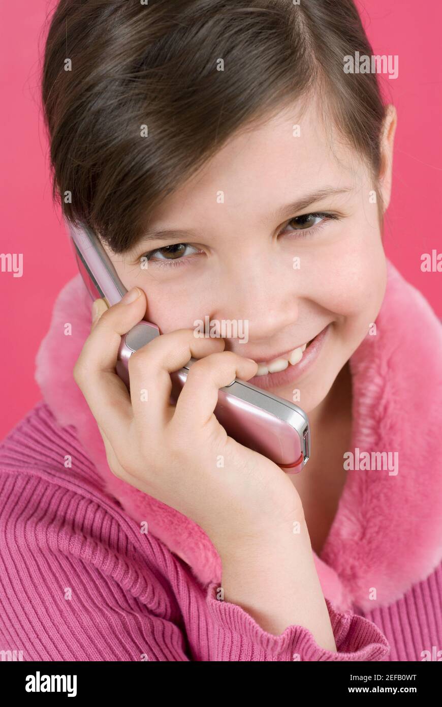 High angle view of a girl talking on a mobile phone Stock Photo