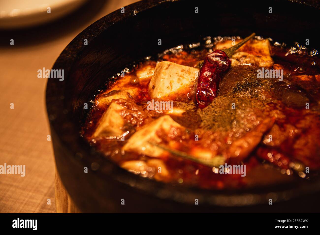 Mapo Tofu is a popular Chinese dish from Sichuan province.The special hot is famous for Sichuan pepper,chili pepper and garlic. Stock Photo