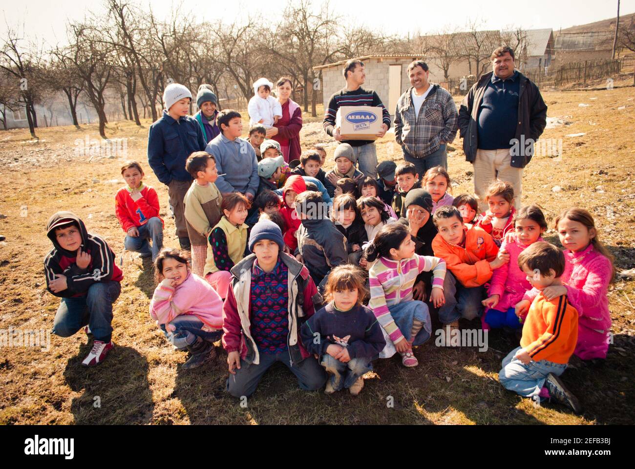SEREDNIE, UKRAINE - MARCH 09, 2011: Roma or Gypsy community needs support to survive Stock Photo