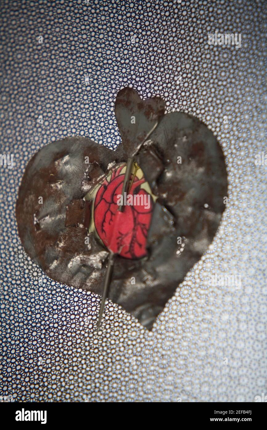 Image of heart and arrow hi-res stock photography and images - Alamy