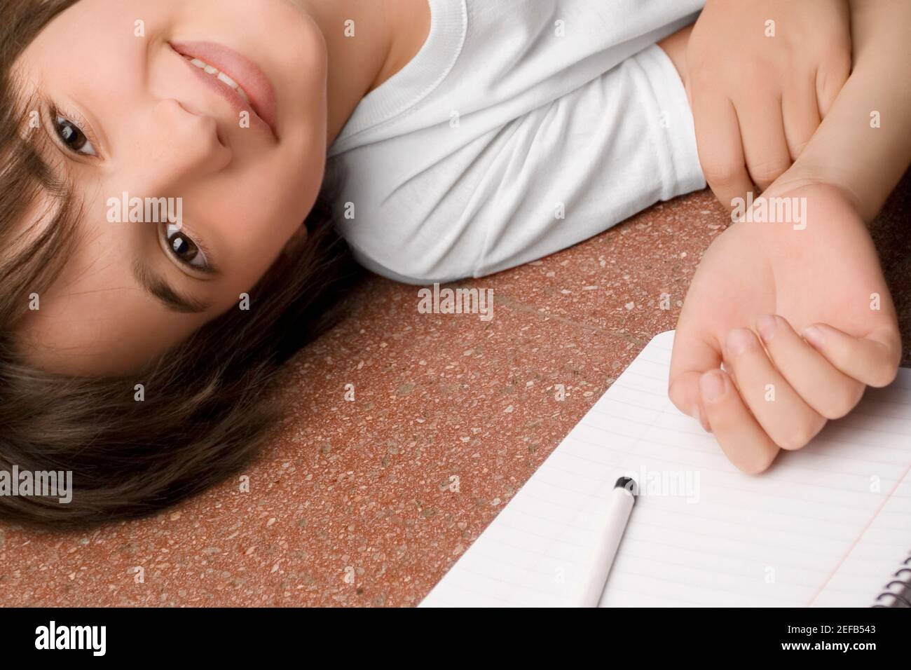 Portrait of a schoolgirl smiling Stock Photo - Alamy