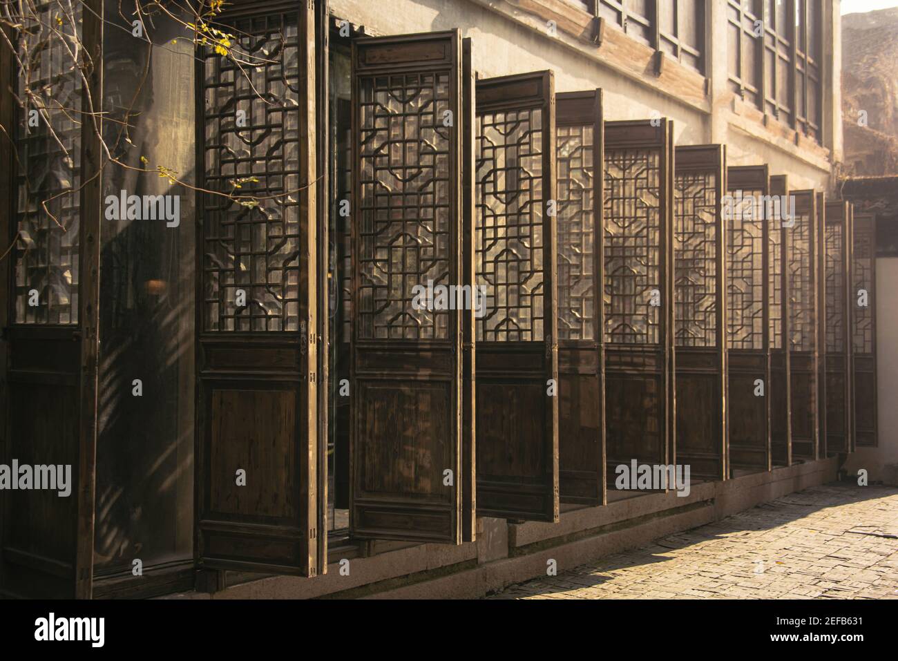 Traditional chinese wooden door at Suzhou,Jiangsu,China in afternoon. Stock Photo