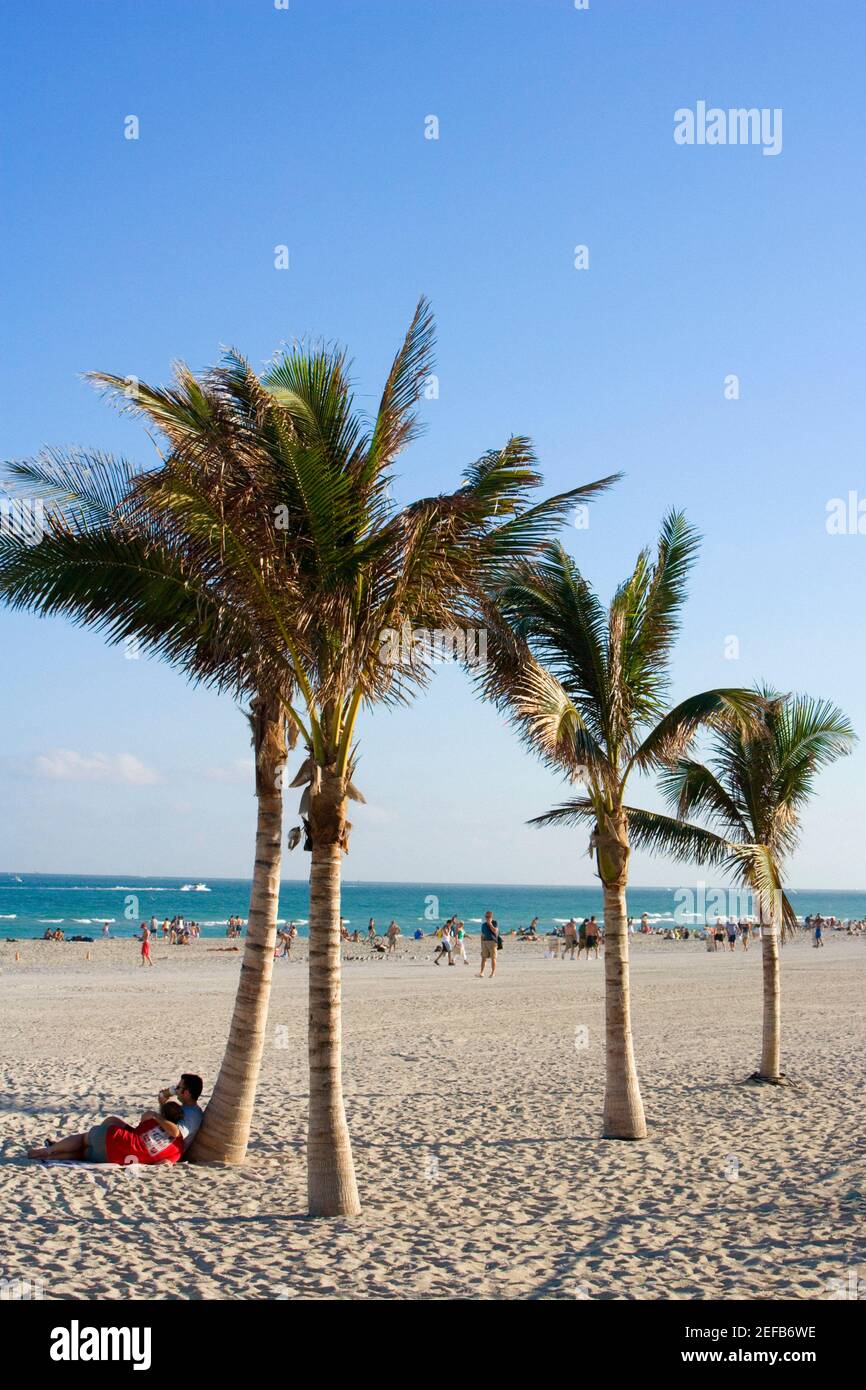 Tourists on the beach, Miami Beach, Florida, USA Stock Photo
