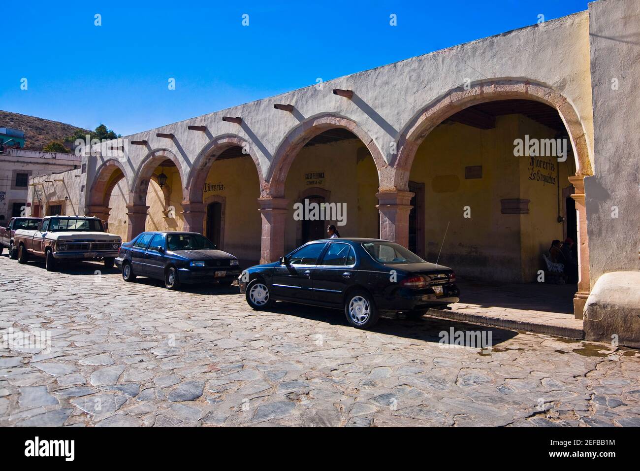 Cars parked in front of a building, Sombrerete, Zacatecas State, Mexico Stock Photo