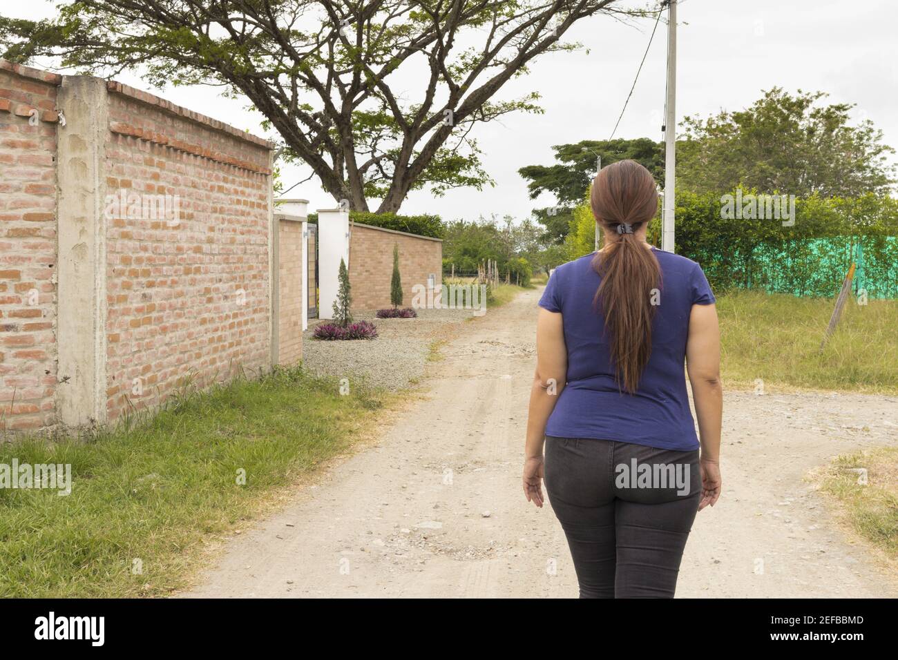 Happy adult woman walking hi-res stock photography and images - Alamy
