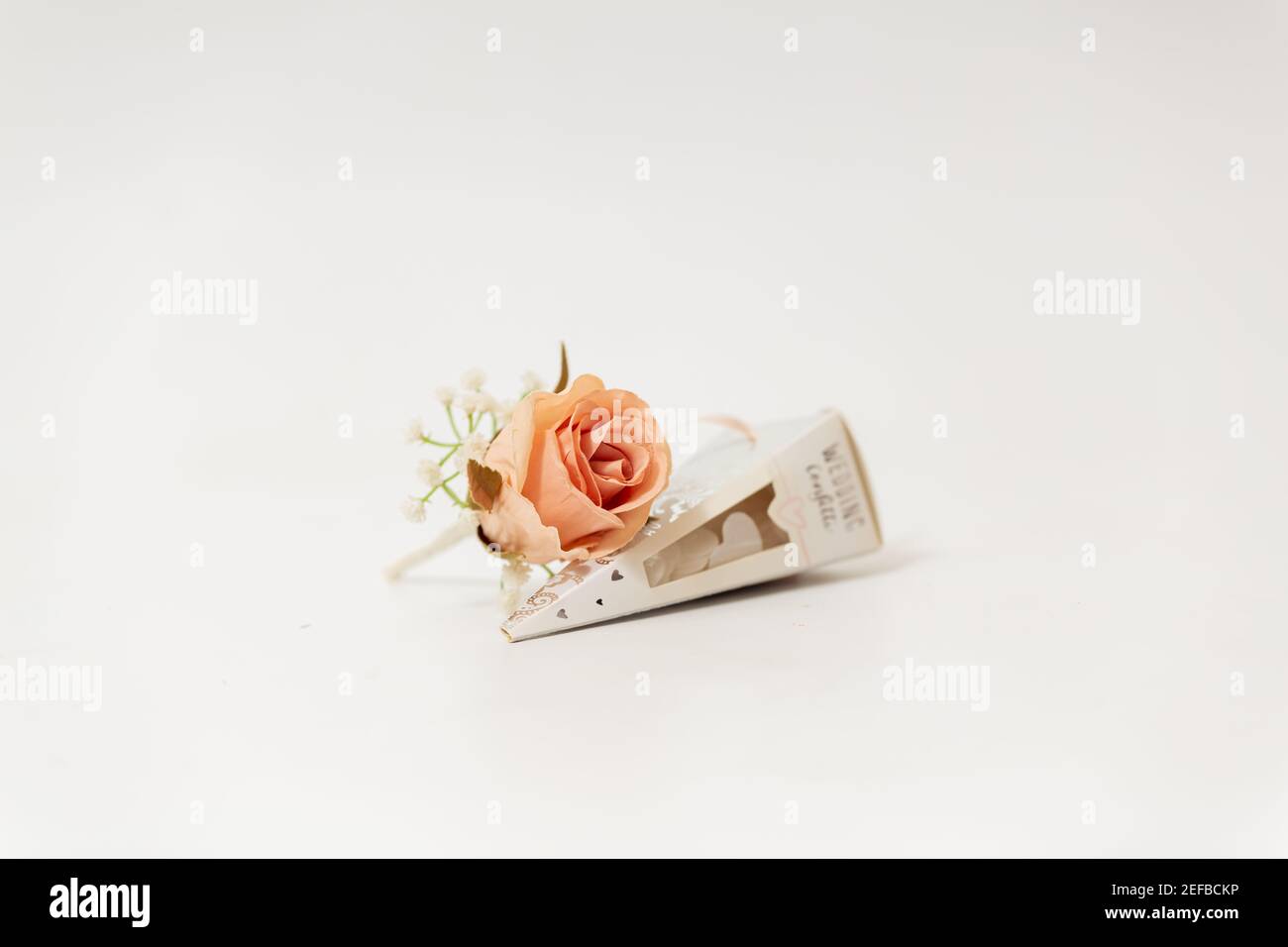 Wedding pinhole flower with a box of confetti Stock Photo