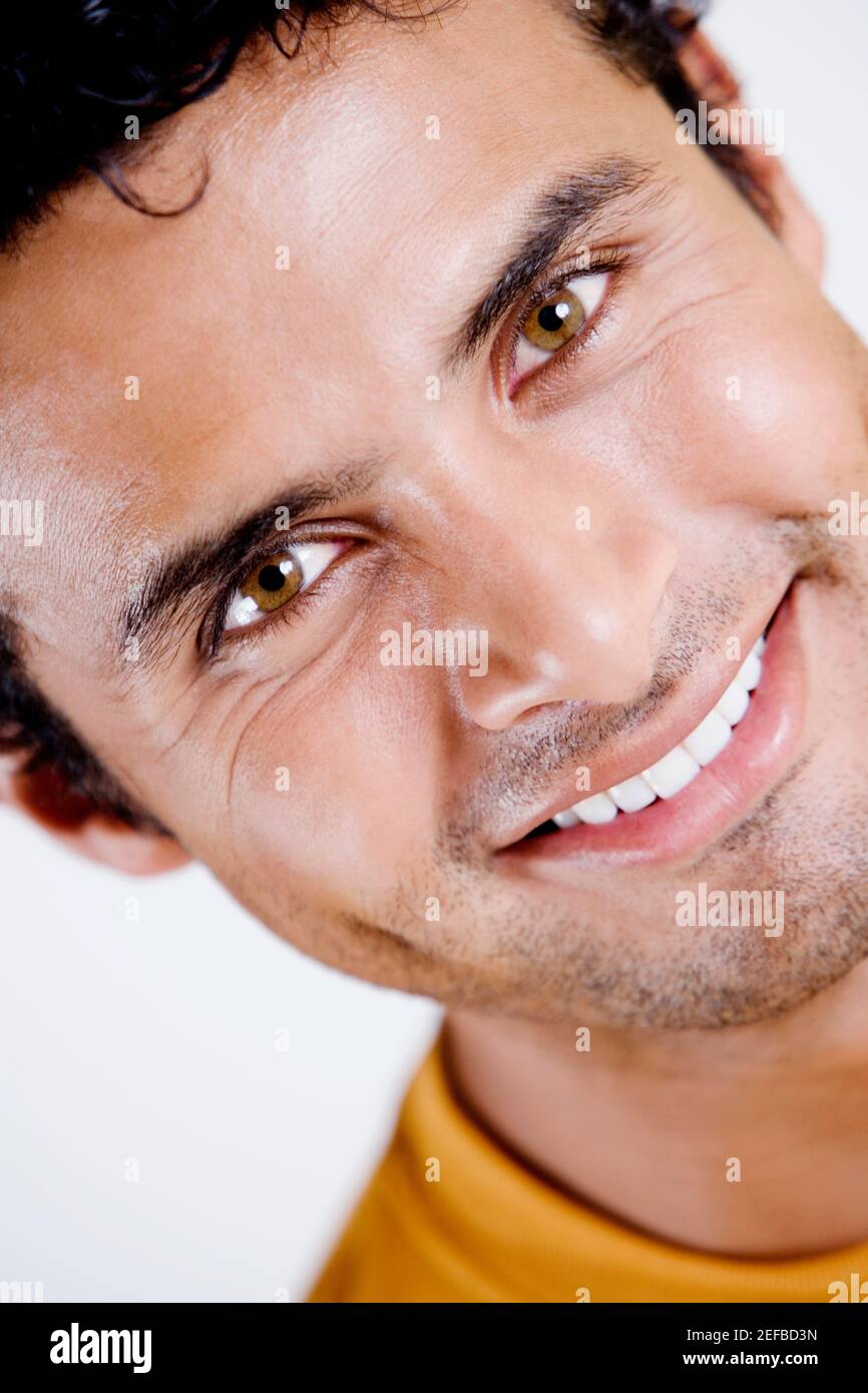 Portrait of a young man smiling Stock Photo - Alamy