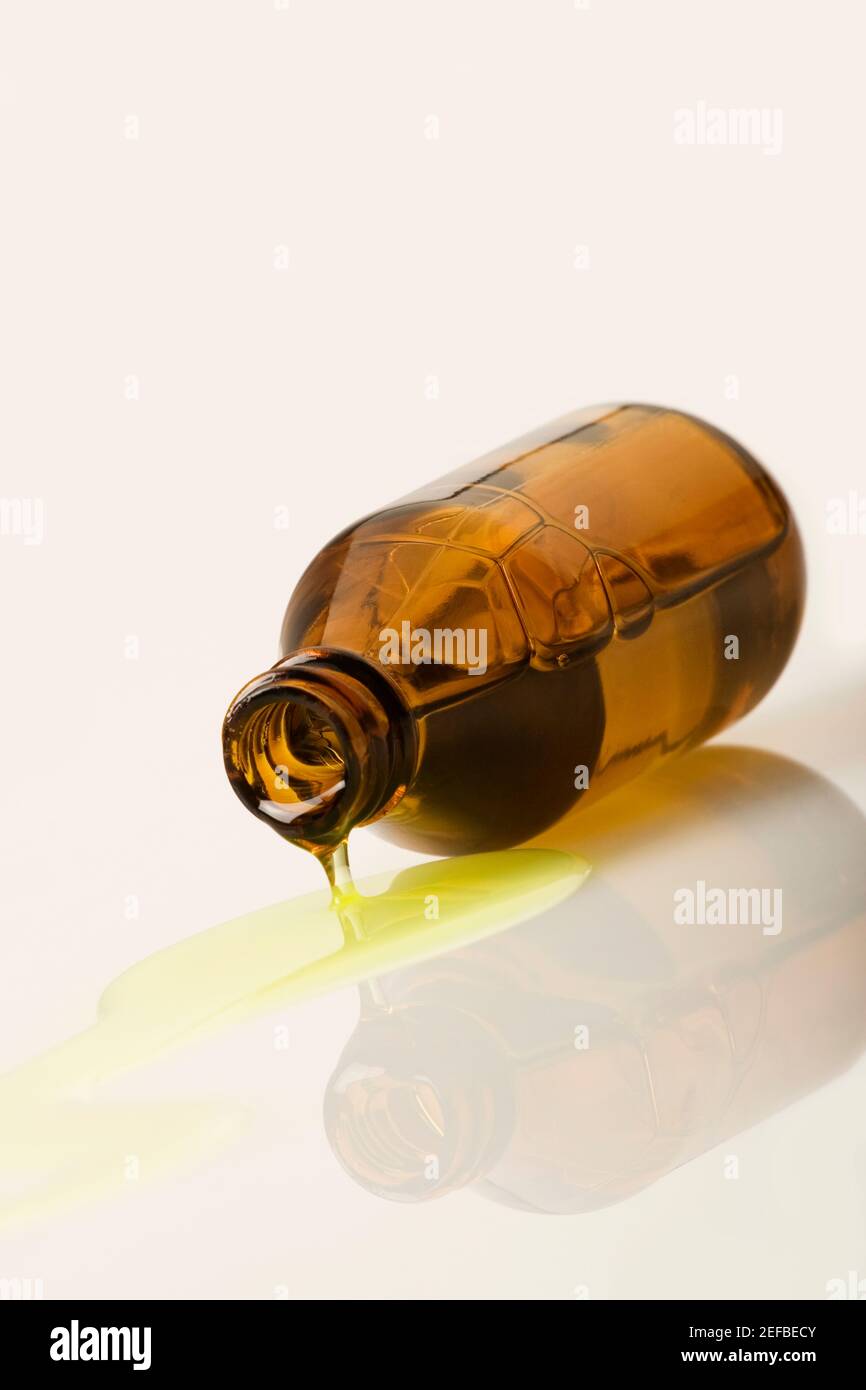 Liquid coming out of a bottle Stock Photo Alamy