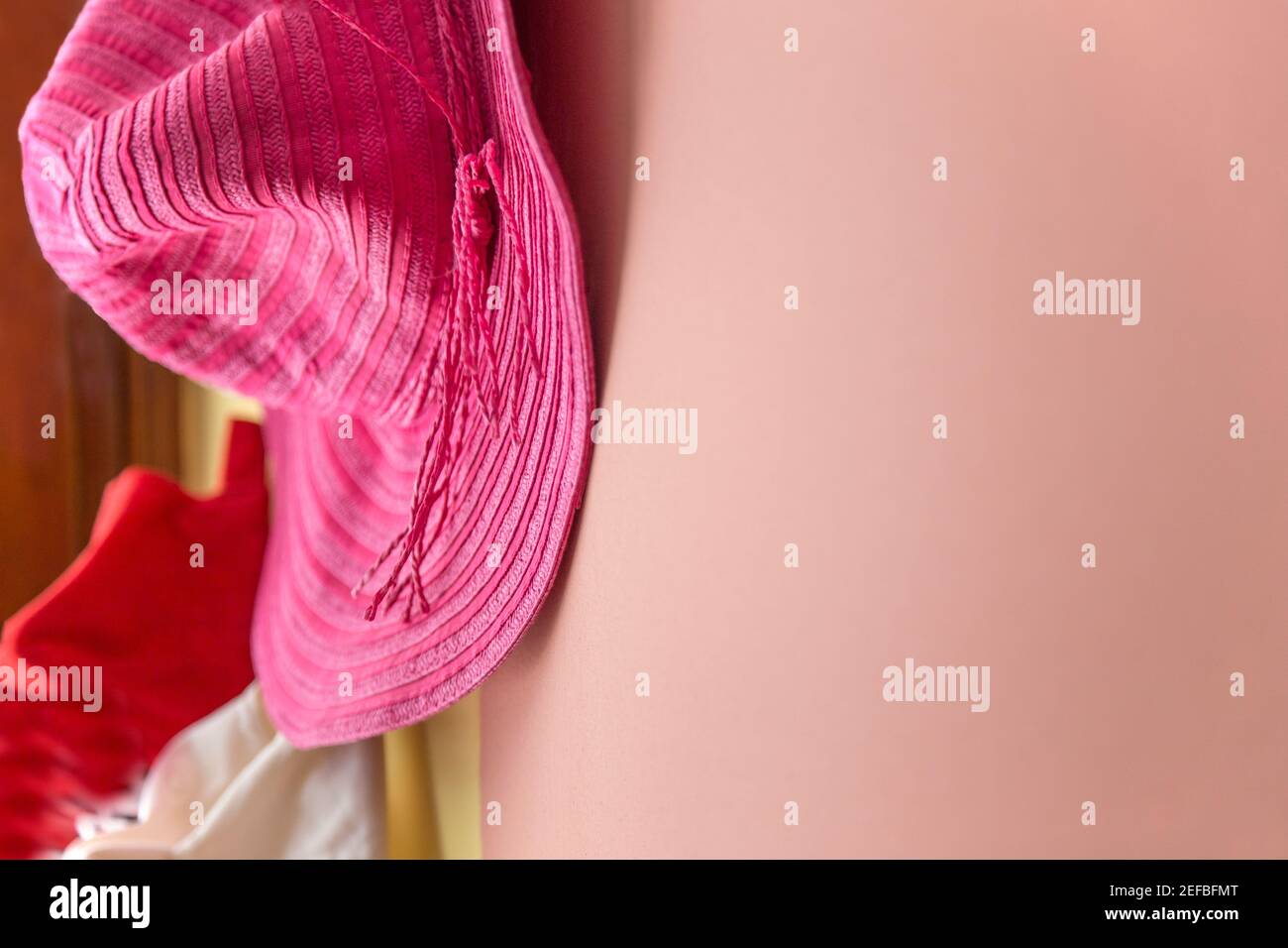 The wall hung various retro hats. And there is very colors in the photo. Stock Photo