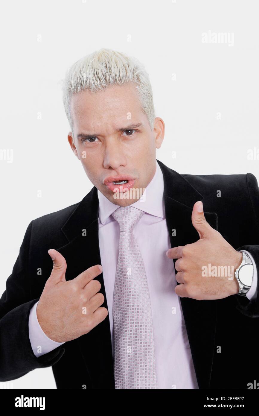 Portrait of a businessman pointing at himself Stock Photo
