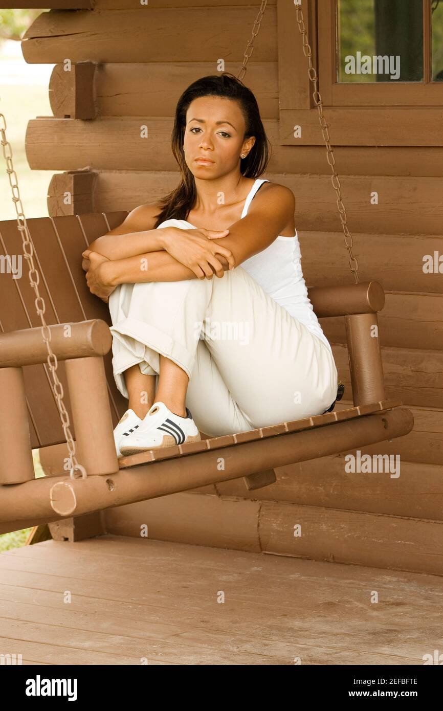 Sitting on the porch swing hi-res stock photography and images - Alamy