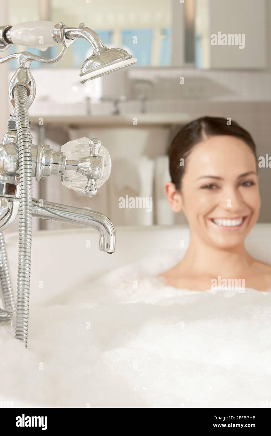 Young woman in a bubble bath Stock Photo Alamy