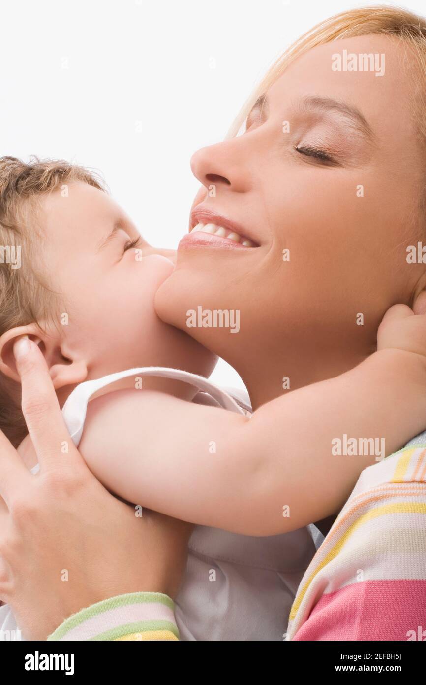 Close up of a mid adult woman with her son Stock Photo