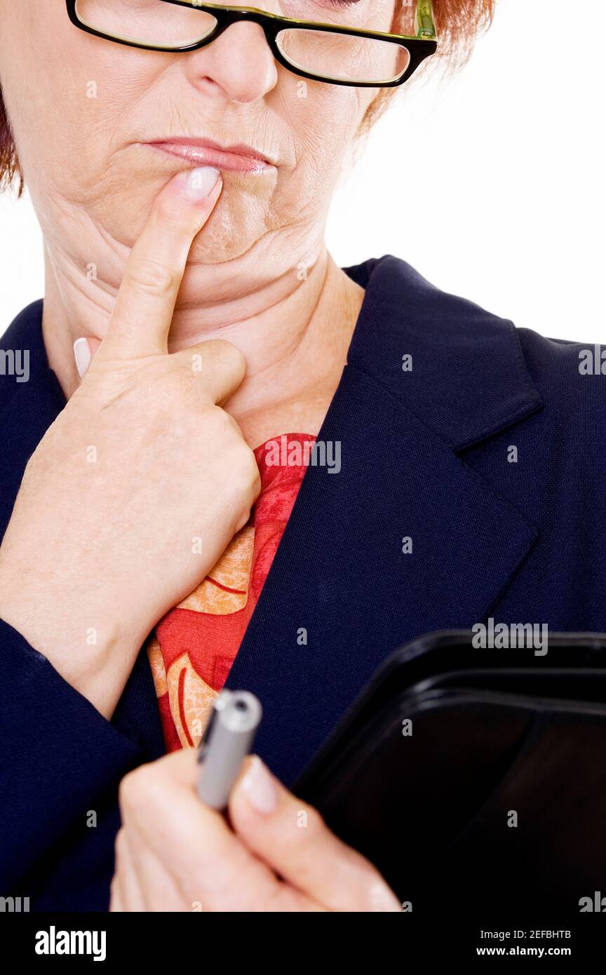 Woman pen eyeglasses thinking hi-res stock photography and images - Alamy