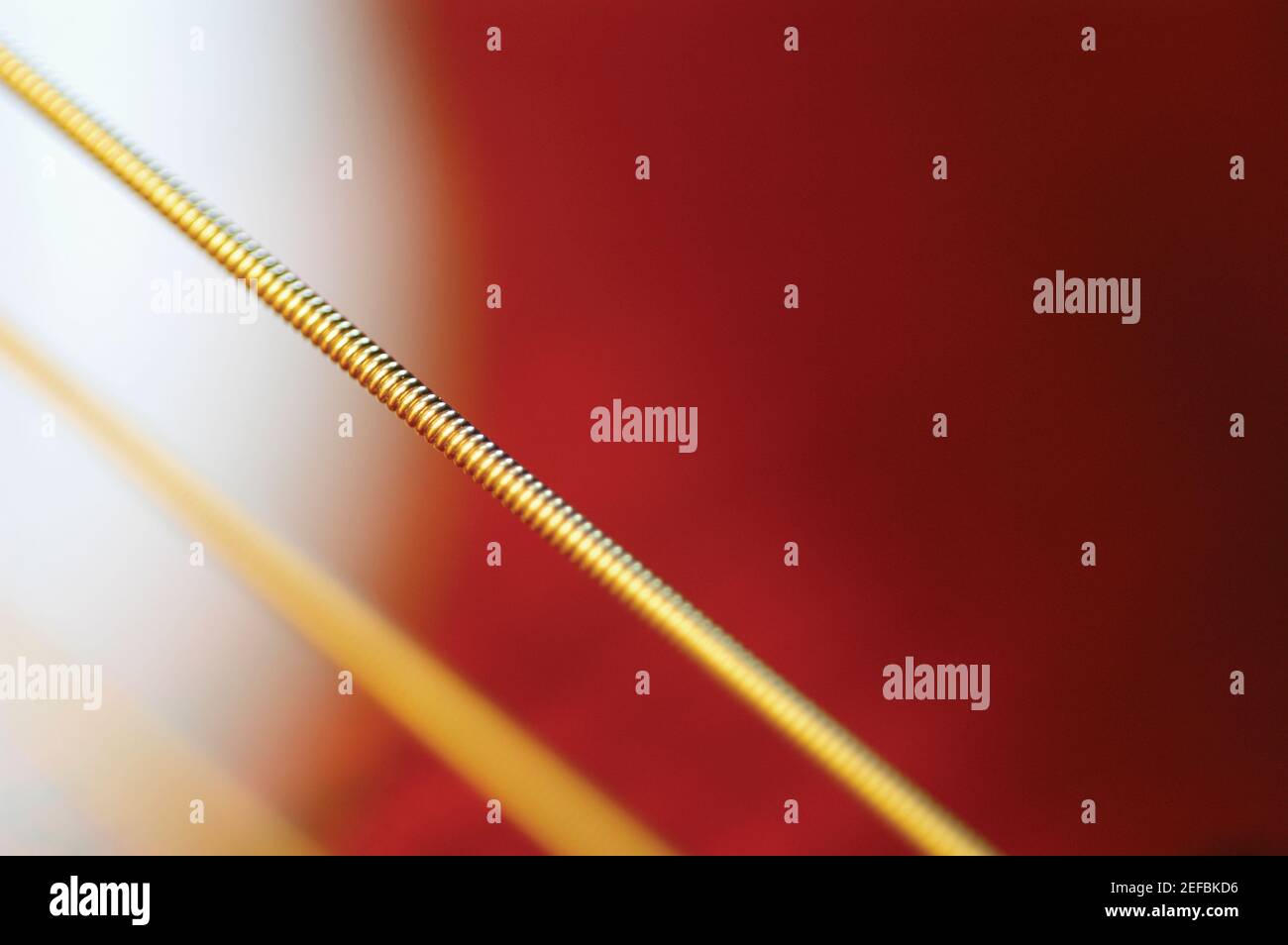 Bomb String Extreme close-up of guitar strings Stock Photo - Alamy