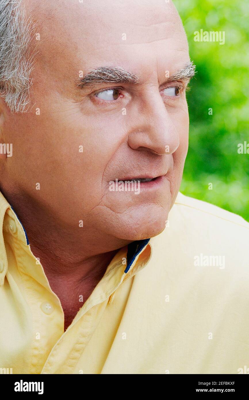 Man looking sideways old senior hi-res stock photography and images - Alamy