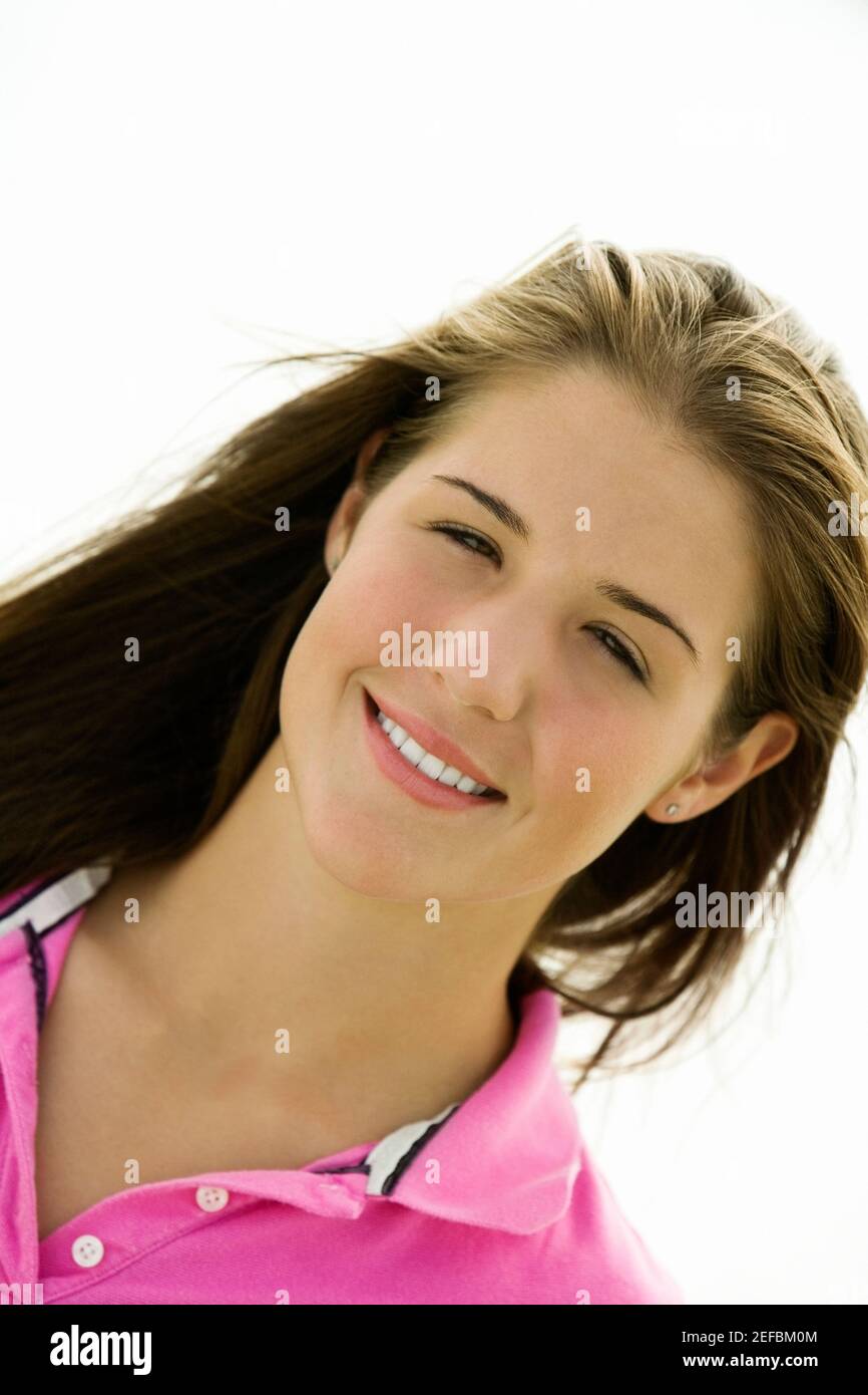 Portrait of a teenage girl smiling Stock Photo - Alamy