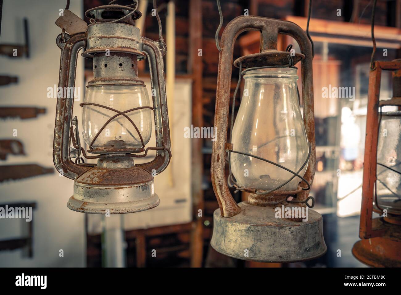 Oldfashioned oil lamp lantern used to illuminate a room Stock Photo