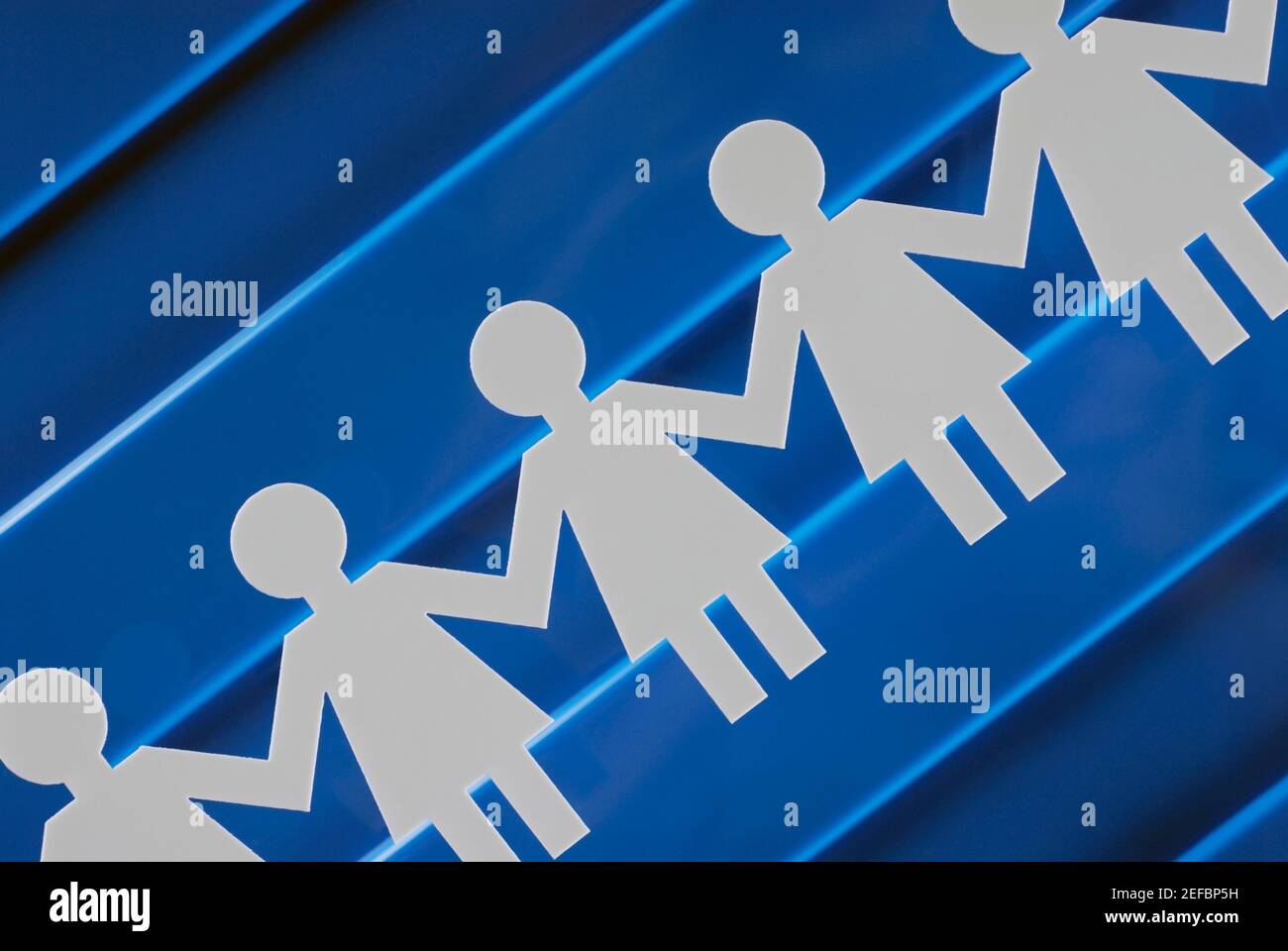 Close up of paper chain dolls Stock Photo Alamy