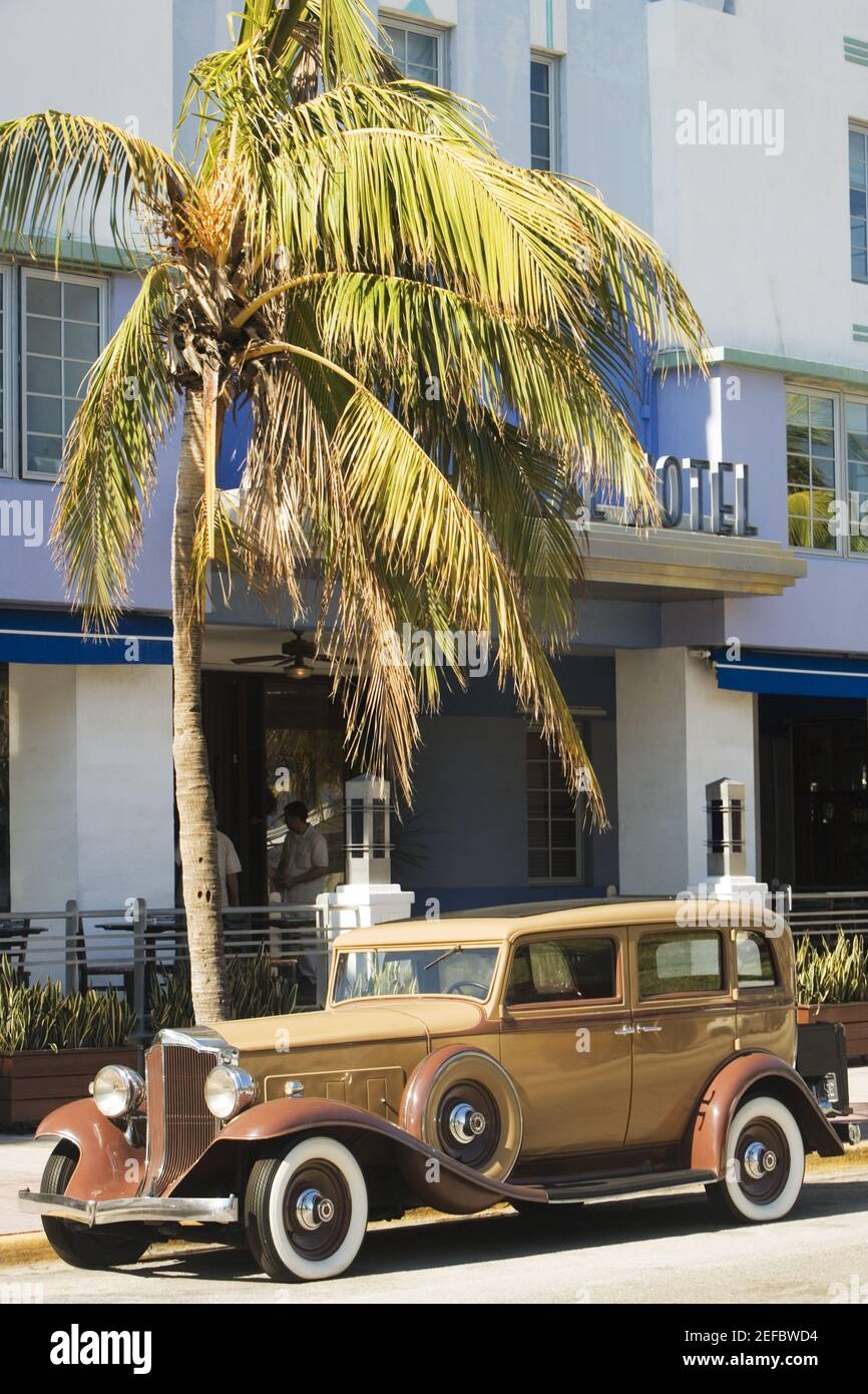 Vintage car parked in front of a hotel, Miami, Florida, USA Stock Photo