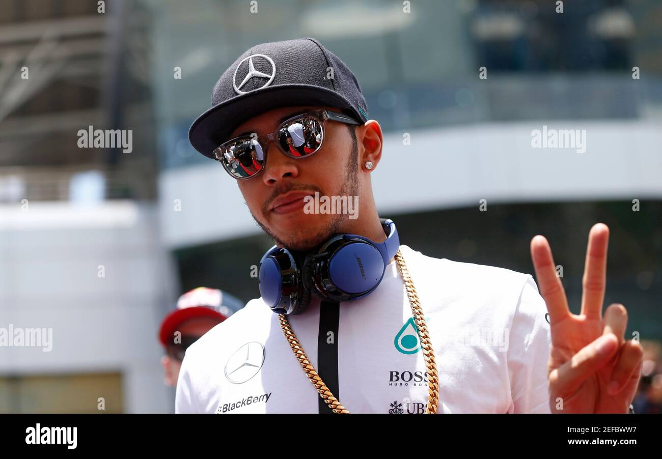 Formula One - F1 - Malaysian Grand Prix 2015 - Sepang International Circuit, Kuala Lumpur, Malaysia - 29/3/15  Mercedes' Lewis Hamilton gestures before the race  Reuters / Olivia Harris  Livepic Stock Photo