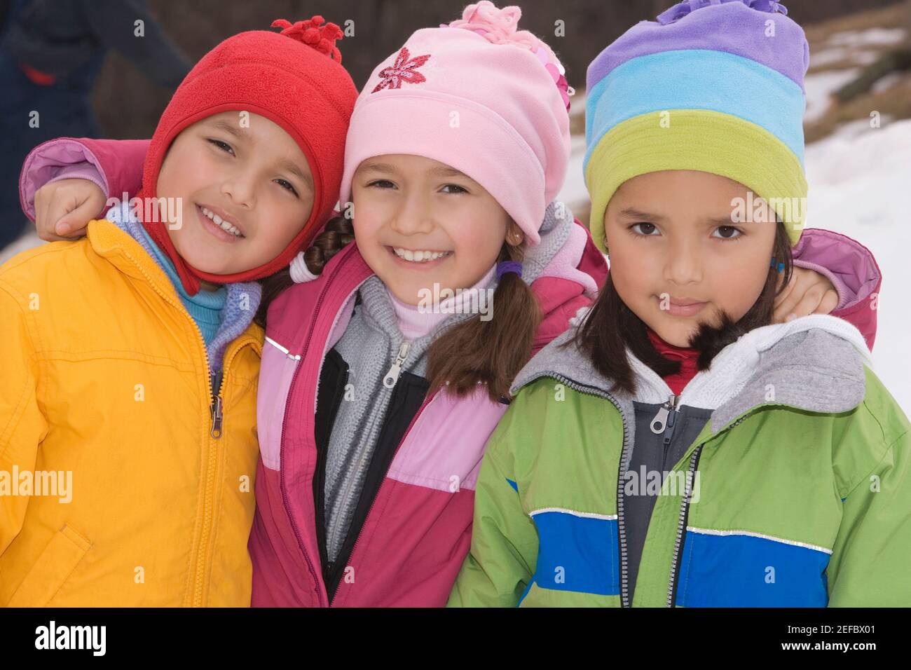 Portrait of two girls and a boy standing together and smiling Stock ...