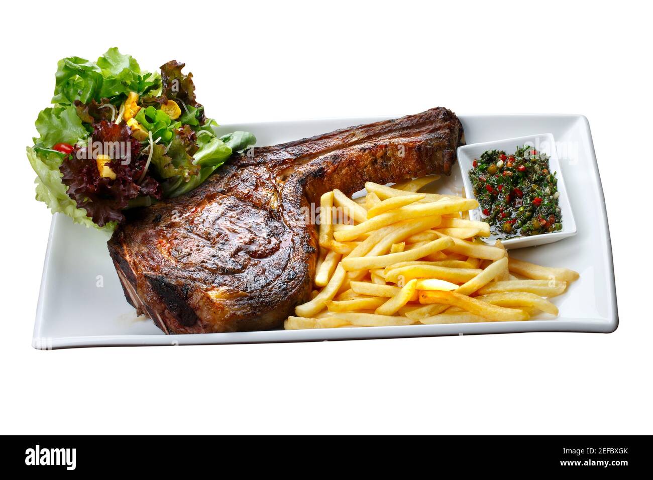 Prime rib with fries and salad Stock Photo Alamy
