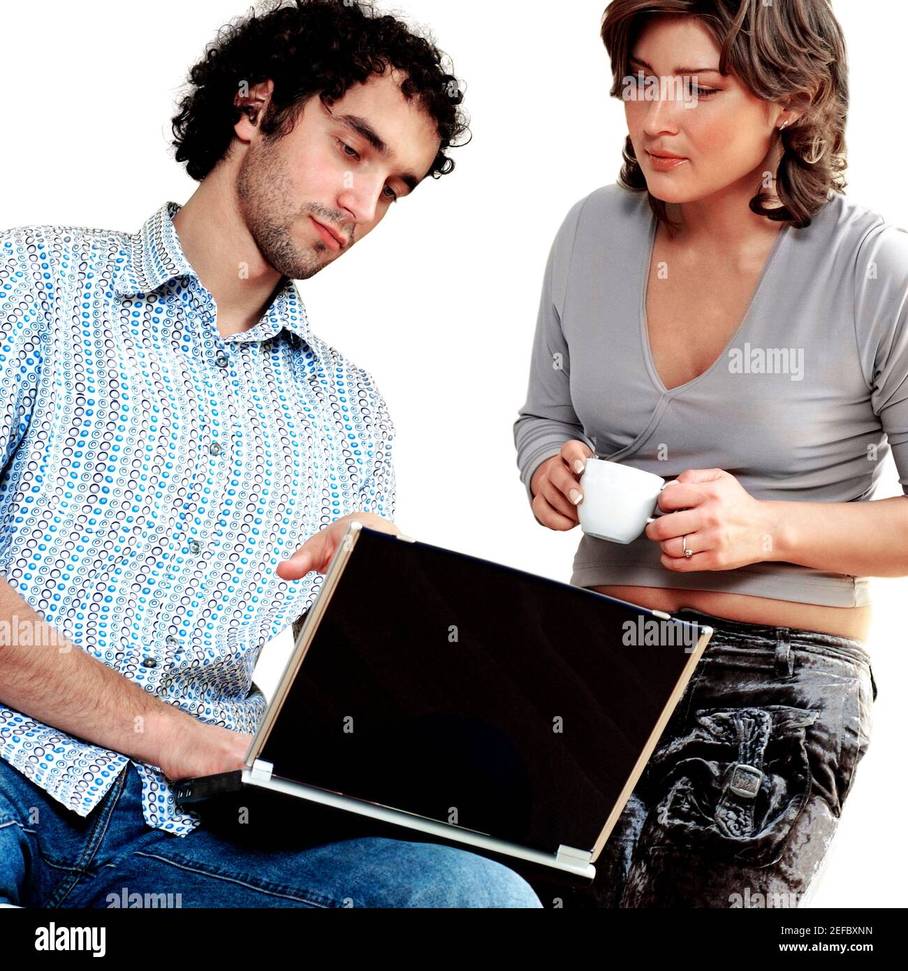 Young couple working on a laptop Stock Photo