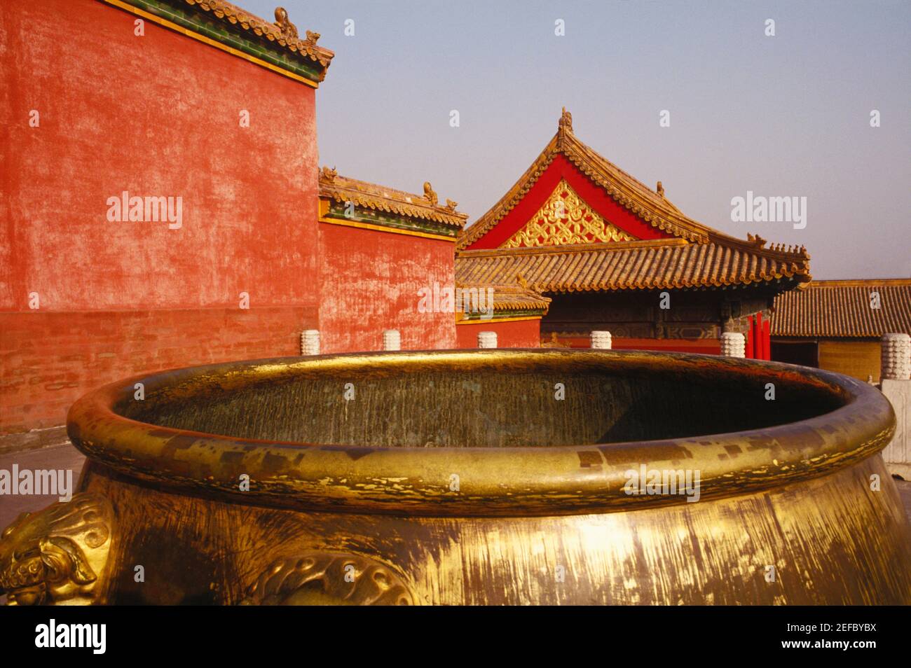 Golden decorative urn in a courtyard, China Stock Photo