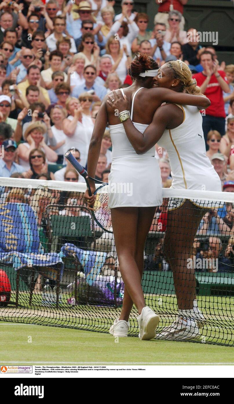 Tennis - The Championships - Wimbledon 2002 - All England Club -  24/6-7/7-2002 Serena Williams - USA celebrates after winning Wimbledon and  is congratulated by runner up and her sister Venus Williams