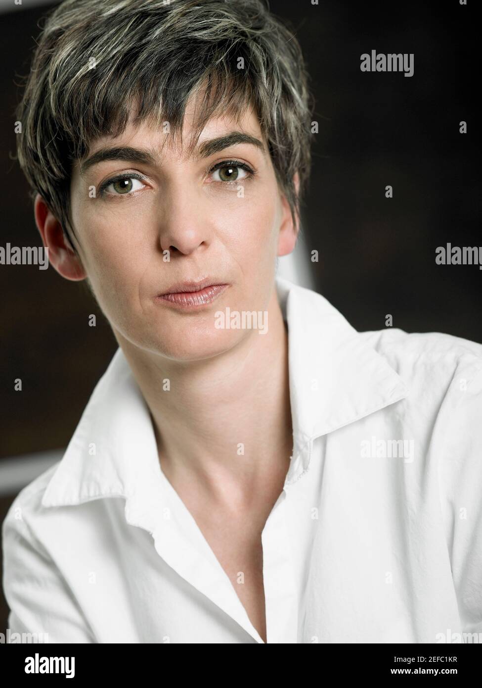 Mature woman button down shirt hi-res stock photography and images - Alamy