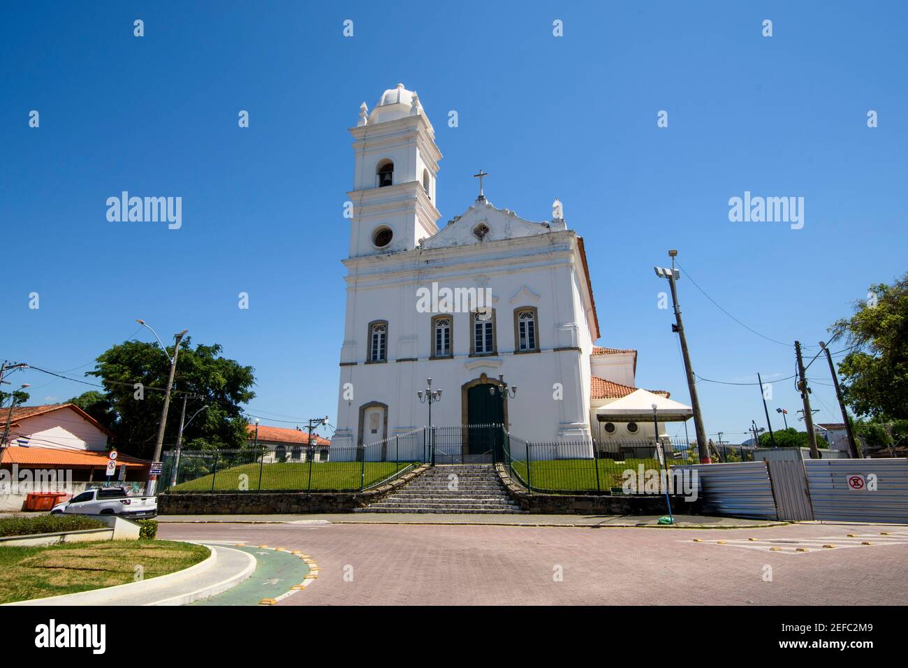 Marica, Brazil - February 16, 2021: Nossa Senhora do Amparo church, a old architecture, in a blue sky day Stock Photo
