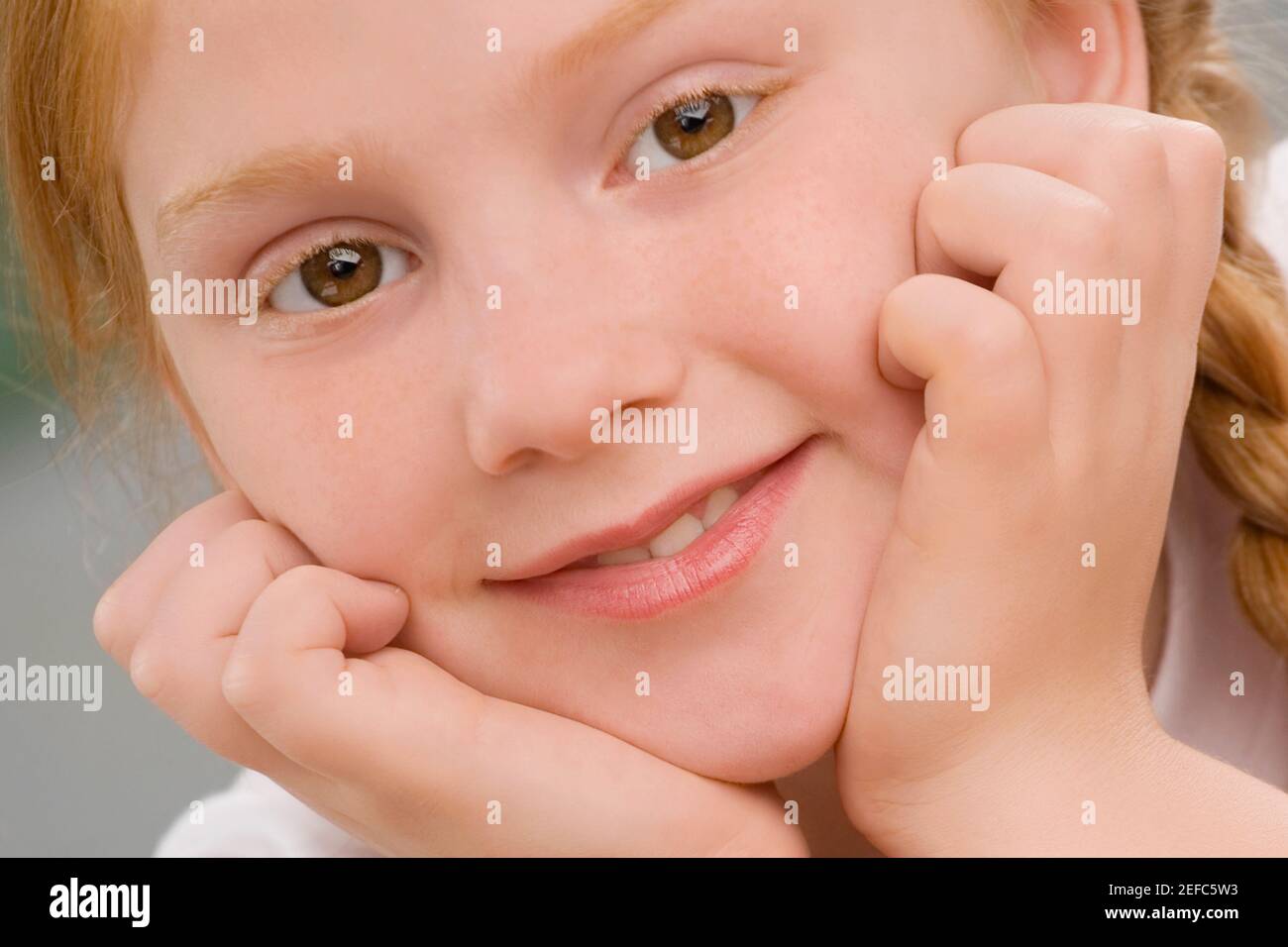 Portrait of a schoolgirl smiling Stock Photo - Alamy