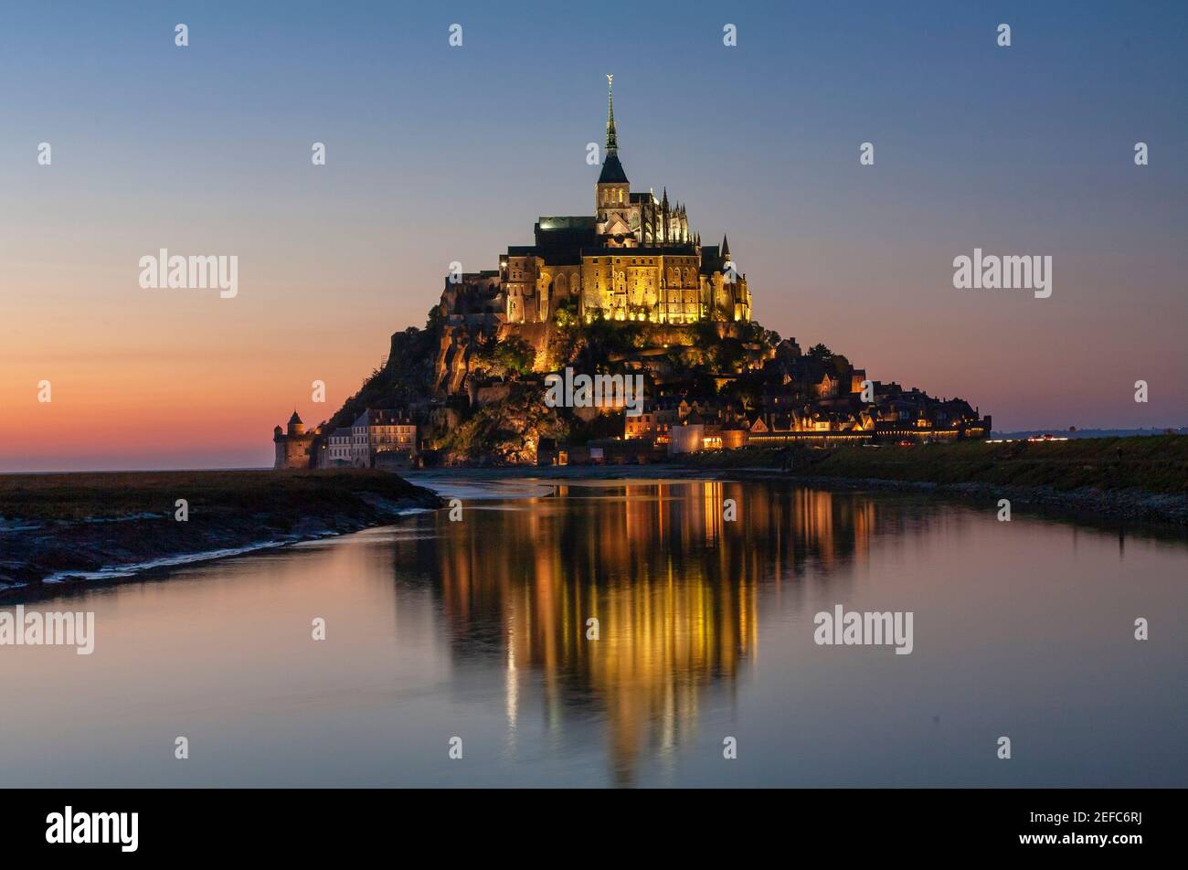 Le Mont Saint Michel is an medieval Abbey located on an island in the St. Michel Bay Stock Photo