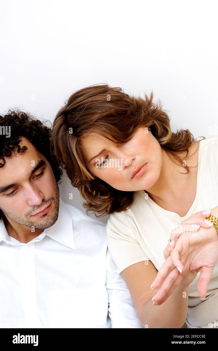 Close-up of a young couple sitting together Stock Photo