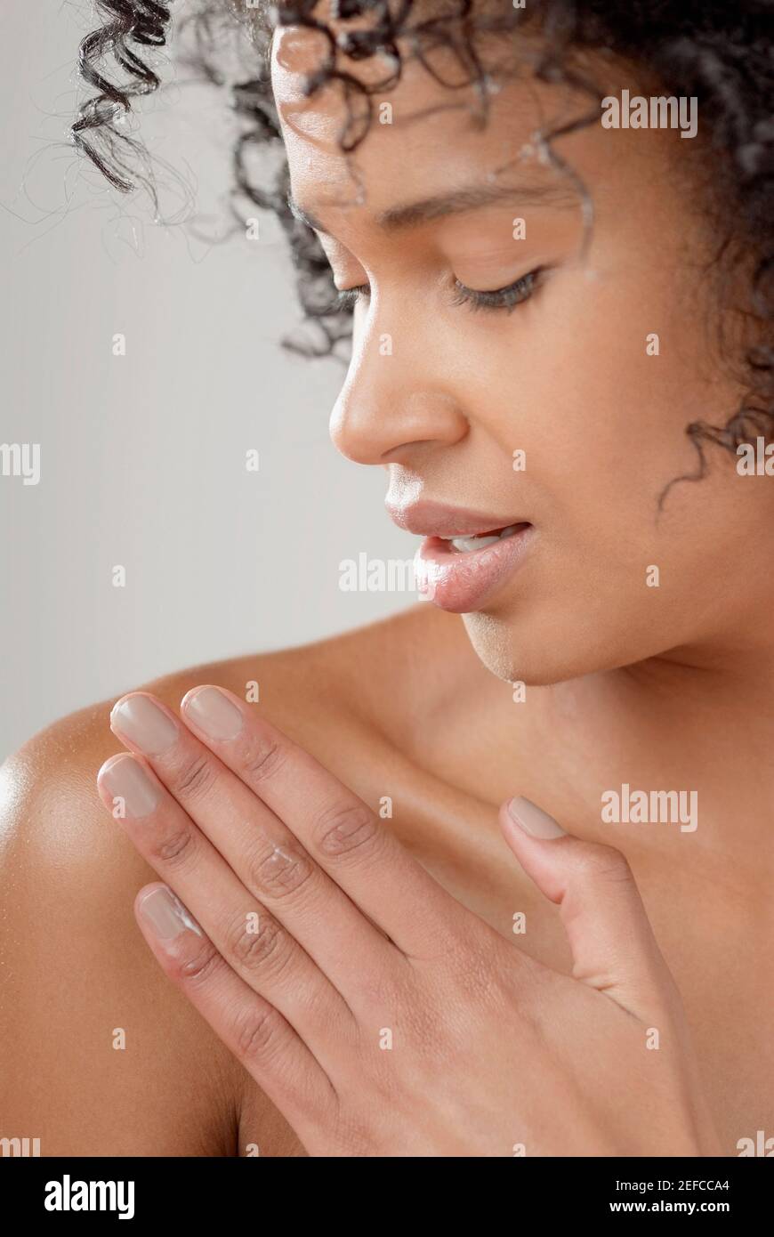 African black woman applying up hi-res stock photography and images - Alamy